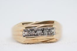 9ct Gold gents ring set with 4 small diamonds Weight 4.5