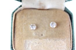 Boxed pair of 9ct gold soliatre earrings