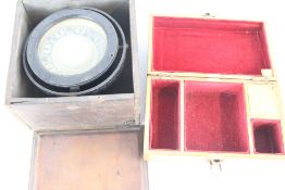 Marine gimbal compass in fitted case, with velvet-lined accessory box