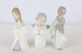 A group of Lladro porcelain figures, hand made in Spain