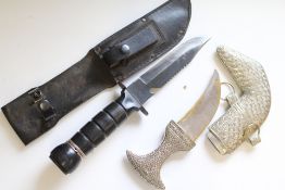 Group of Knives: Survival Knife in Leather Sheath and Jambiya with White-Metal Mounts