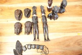 Group of African-style carved hardwood masks and figures