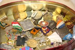 Unsorted box of medals, pin brooches & others