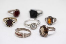 Seven Gemmed Silver Rings.