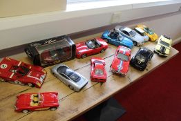 A group of die-cast model cars including a boxed Maisto Audi TT Roadster