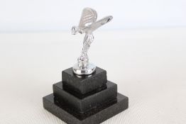 Chrome flying lady on marble base