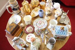 A mixed group of gilt-metal teawares, porcelain, and decorative objects