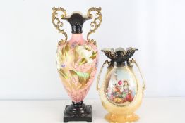 Two Victorian decorative porcelain vases with gilt handles