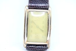 Gents Vintage Helvetia Rolled Gold 20 microns Tank Shaped Case Watch. It has a Silvered Dial but the