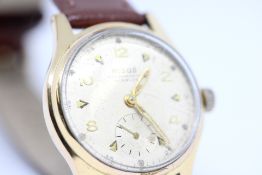 Nisus Swiss Gold-Plated Mechanical Manual Wind Watch with small seconds dial and screw down back.