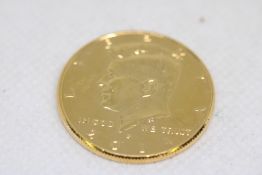 $ ½ Gold Plated John F Kennedy 2014 Coin in Pouch with certificate.