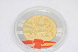 Euro 2012 Football commemorative coin. Spain Winners 2012 on one side and co-hosted by Poland and