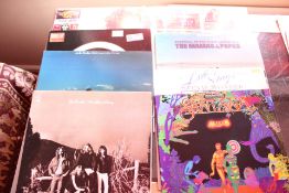 A Collection of Classic Rock and Soul Vinyl LP Records Including Santana and The Byrds