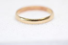 Yellow metal, tested for gold wedding band Weight 1.5g