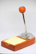 Desk note pad in the form of a car gear stick with box