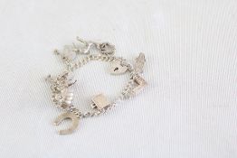 Silver charm bracelet 9 charms