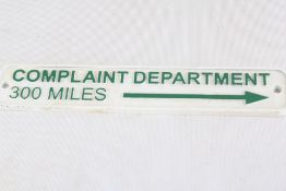 Cast iron complaint department 300 miles sign
