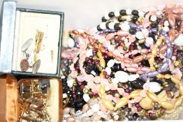 Unsorted box of costume jewellery