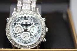 Akribos XX1V Gents Gemmed Stainless Steel Watch with Day & Date in Box with Papers.