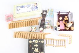 An Assortment of Wooden and Ceramic Dollhouse Furnishings and Accessories