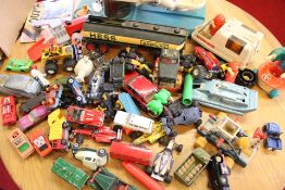 A Collection of Die-Cast and Plastic Toy Vehicles