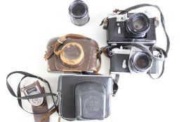 A Collection of Asahi Pentax and Zenit 35mm SLR Cameras and Accessories