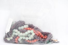 Bag of unsorted costume jewellery