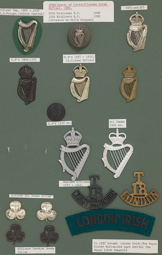 18th County of London (London Irish) 16 items of insignia. Good carded ...