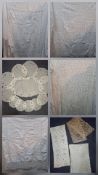 A quantity of vintage table linen to include a large embroidered white cotton tablecloth A/F