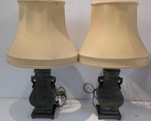A pair of Chinese bronze archaic vases converted to table lamps, 70cm high including shade Location: