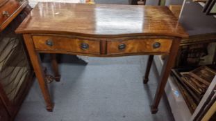A reproduction mahogany side table having a serpentine front and single drawer, 76.5cm h x 92cm w