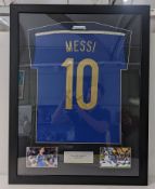 An Argentina framed football shirt signed by Lionel Messi with Becket label, 66.5cm x 86.5cm