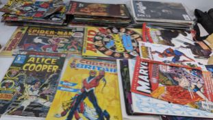 A collection of comics and magazines to include 1970's Marvel comics including SpiderMan, Captain