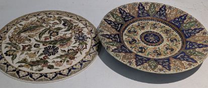 A Swiss Thoune ceramic Majolica charger, together with one other stamped J.H to the reverse