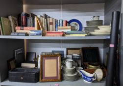 A mixed lot of books, tea wares, picture frames, and other items, to include fishing rods, a