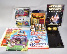 A Collection of One Arm Bandit Parts and Reels, Posters Etc