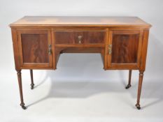 A Edwardian Mahogany Dressing Table or Writing Desk with Centre Drawer Flanked by Two Cupboards,