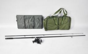 A New and Unused Carpmax Fishing Rod, a New MBLM Fishing Reel together with Rod Holdall and 2 Carp