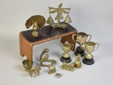 A Folding Novelty Stand in the Form of a Table together with Various Brass Ornaments, Trophies Etc