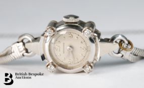 Lady's 14ct White Gold and Diamond Longines Cocktail Watch