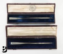 Near Pair of Silver Oars
