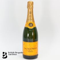 Three Bottles of Veuve Clicquot Champagne