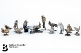 Set of Fourteen Cast Silver Models of Birds