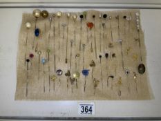 A QUANTITY OF HAT / TIE PINS, VARIOUS DESIGNS AND MATERIALS
