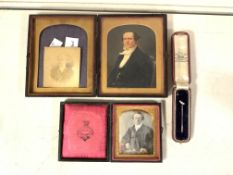 A CASED ANTIQUE DAGUERREOTUPE PORTRAIT, ANOTHER CASED PORTRAIT, AN ANTIQUE PHOTOGRAPH AND A CASED