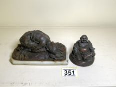 A BRONZE SCULPTURE OF A FEMALE, IN CURLED UP POSITION, ON MARBLE BASE AND A BRONZE MODEL OF A