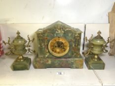 VICTORIAN GREEN ONYX AND GILT METAL MOUNTED THREE-PIECE CLOCK GARNITURE WITH ARCHITECTURAL CLOCK AND