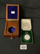 A CASED CONTINENTAL SILVER FOB WATCH, STAMPED '800', DIAL MARKED PAUL LOCLE, AND A WOODEN FOB