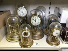 SEVEN VINTAGE DOME CLOCKS, SHATZ, KUDO AND MORE