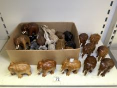 QUANTITY OF CARVED WOODEN ELEPHANTS